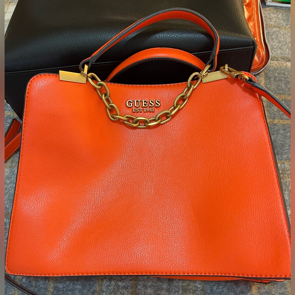Guess hand bag.  Many compartments, very good condition